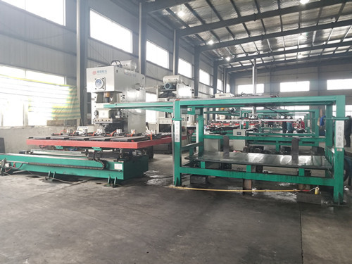 大圓片自動(dòng)落料機是怎(zen)麽工作的